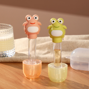 Мультфильм-лягушка в форме детского лекарства